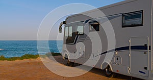 RV, Recreational vehicle, camping at the beach.