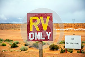RV only text, Warning sign, blur desert background. Antelope canyon Arizona, USA