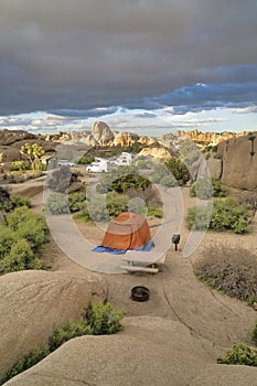 RVs and tent at a campsite in scenic Joshua Tree National Park in California