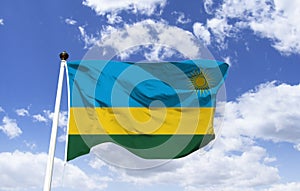 Rwanda Flag Template floating under the blue sky.