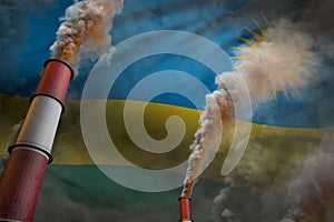 Rwanda pollution fight concept - two big plant chimneys with heavy smoke on flag background, industrial 3D illustration
