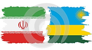 Rwandan and Iran grunge flags connection vector