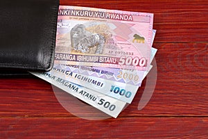 Rwandan money in the black wallet
