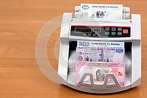 Rwandan money - franc in a counting machine