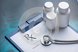 Rx prescription on clipboard with stethoscope