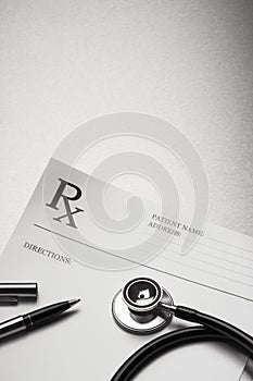 RX prescription form stethoscope and pen