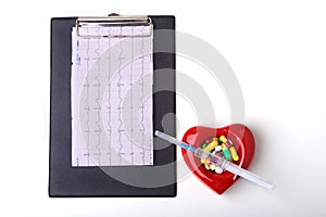 RX prescription, Red heart, asorted pils and a stethoscope on white background