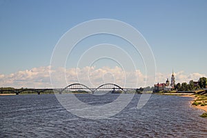 Rybinsk. View of the building of the grain exchange, the Holy Transfiguration Cathedral and the bridge over the Volga river. View