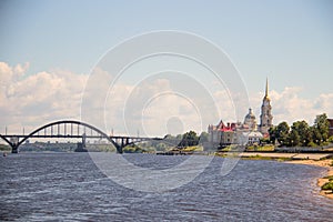 Rybinsk. View of the building of the grain exchange, the Holy Transfiguration Cathedral and the bridge over the Volga river. View