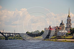 Rybinsk. View of the building of the grain exchange, the Holy Transfiguration Cathedral and the bridge over the Volga river. View