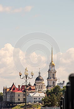 Rybinsk. View of the building of the grain exchange, the Holy Transfiguration Cathedral and the bridge over the Volga river. View