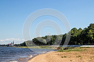 Rybinsk. View of the building of the grain exchange, the Holy Transfiguration Cathedral and the bridge over the Volga river. View