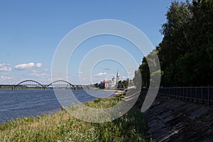 Rybinsk. View of the building of the grain exchange, the Holy Transfiguration Cathedral and the bridge over the Volga river. View