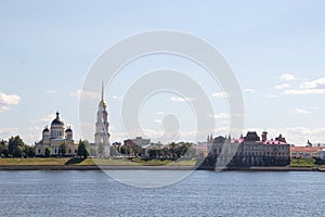 Rybinsk. View of the building of the grain exchange, the Holy Transfiguration Cathedral and the bridge over the Volga river. View