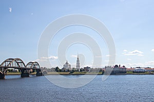 Rybinsk. View of the building of the grain exchange, the Holy Transfiguration Cathedral and the bridge over the Volga river. View