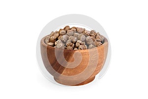 Rye bran in wooden bowl isolated on white background.