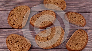 The rye bread cut into pieces and laid out on a table