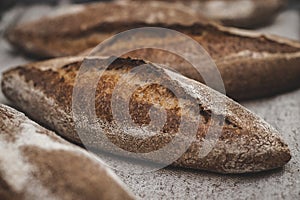 Rye bread on a linen background. Homemade baking