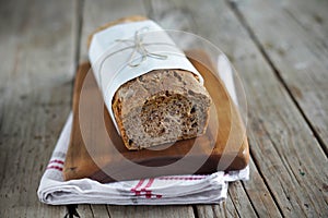 Rye bread loaf with oats, wheat and flax seeds, sliced photo