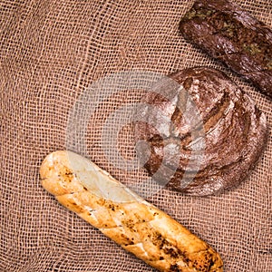 Rye bread,a loaf of white and rye bread on the table close-up,with space