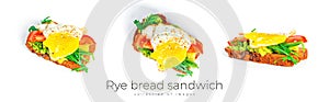 Rye bread sandwich with guacamole, arugula, tomatoes and quail egg isolated on a white background. Bruschetta with