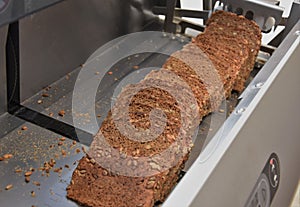 Rye bread with seeds in bread slicer