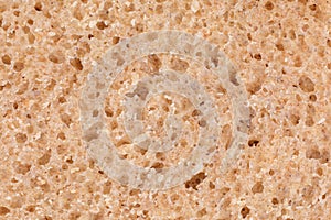 Rye bread slice texture background, close up
