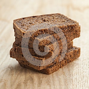 Rye bread slices on table