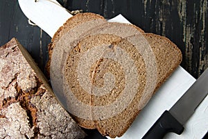 Rye bread slices on a wooden tray