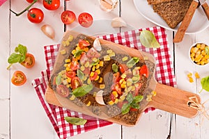 Rye bread withsweet  corn, basil and tomato.