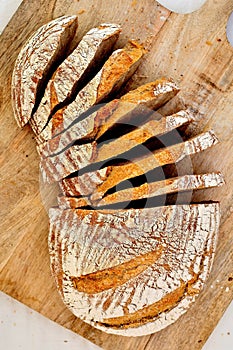 Rye sourdough homemade bread on wooden plate