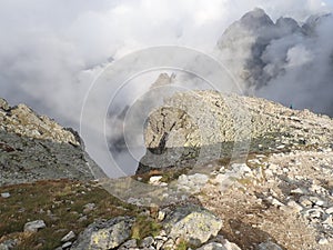 Rysy Mountain valley on a high tatra mountains-mountain valley in dense mist and clouds-Slovakia