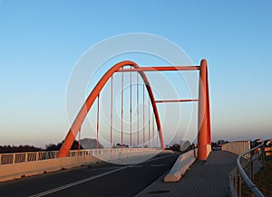 Rzeszow, Poland - 9 9 2018: Suspended road bridge across the autobahn. Metal construction technological structure. Modern