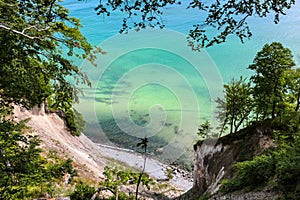 RÃ¼gen Baltic  coast and chalk cliffs framed in trees, Jasmund National Park, Germany