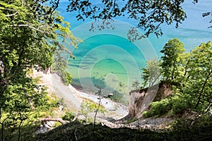 RÃ¼gen Baltic  coast and chalk cliffs framed in trees, Jasmund National Park, Germany