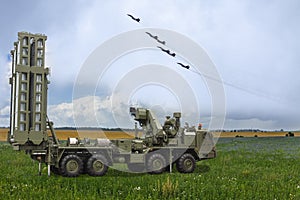 The S-300 missile system against the background of Russian military aircraft
