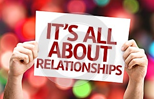 It's All About Relationships card with colorful background with defocused lights photo
