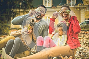 That`s we are. Family making fun , enjoying in autumn season.