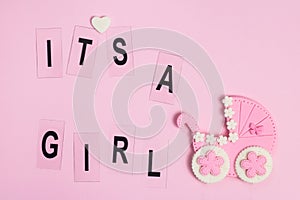 It`s a girl pink card. Newborn background. Baby shower invitation. Birth announcement. Flat lay photo