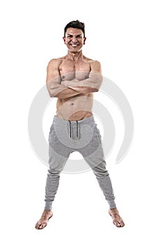 40s hispanic sport man and bodybuilder posing happy with strong naked torso showing fit muscular body