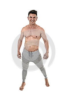 40s hispanic sport man and bodybuilder posing happy with strong naked torso showing fit muscular body