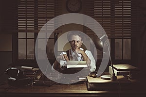 1950s journalist in his office late at night photo