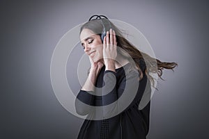 She`s listening to her favorite music