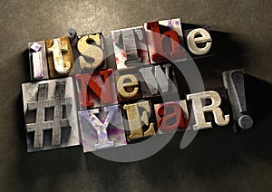 It's the new year! A title celebrating 2016 on wooden ink splatt