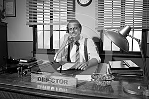 1950s office: director working on the phone