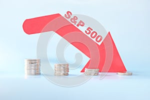 S&P 500 index in red downward arrow with decreasing stack of coins. Bearish run market in United States US stock market.