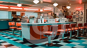 1970's retro style diner with checkered floor and red stools. Empty business with no people