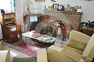 A 1940s 1950s living room with vintage furniture