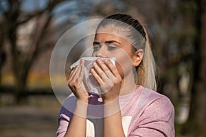 It`s the season of sneezes - Woman having autumn cold or allergy