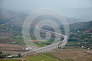 S-shaped road in Sicily between hills